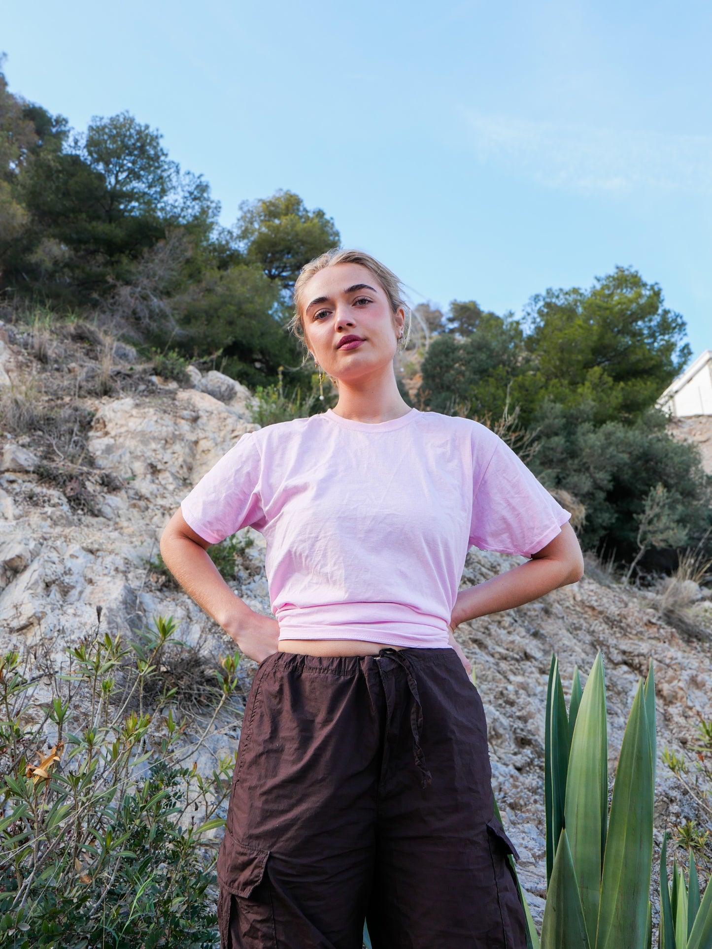 Caroline er 169 cm høj og bruger størrelse M. | lyserød