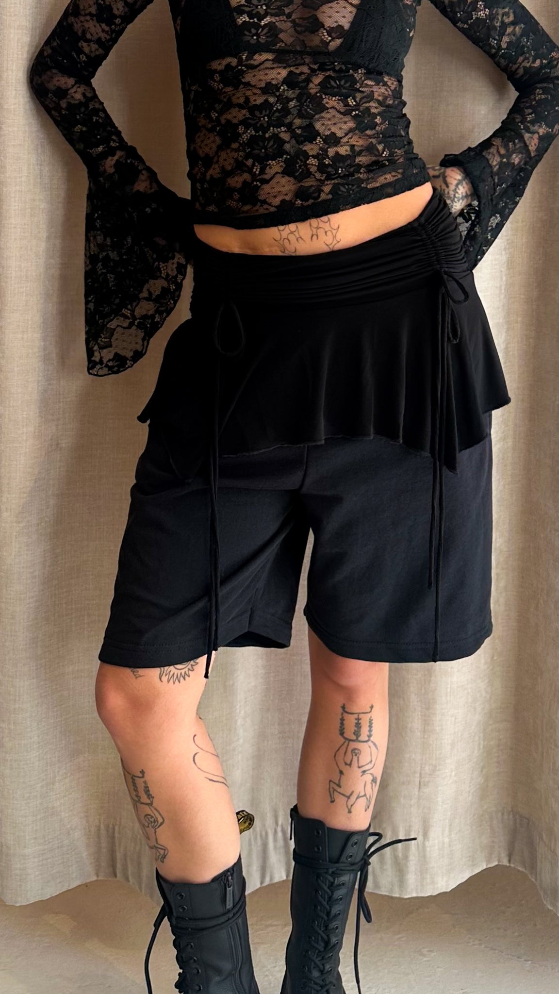 Astrid er 165 cm høj og bruger størrelse Medium.