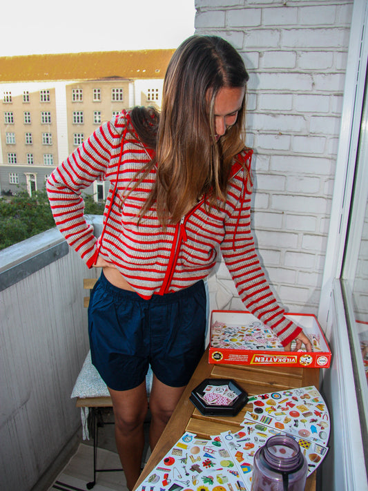 Nadia er 170 cm høj og bruger størrelse M-L.