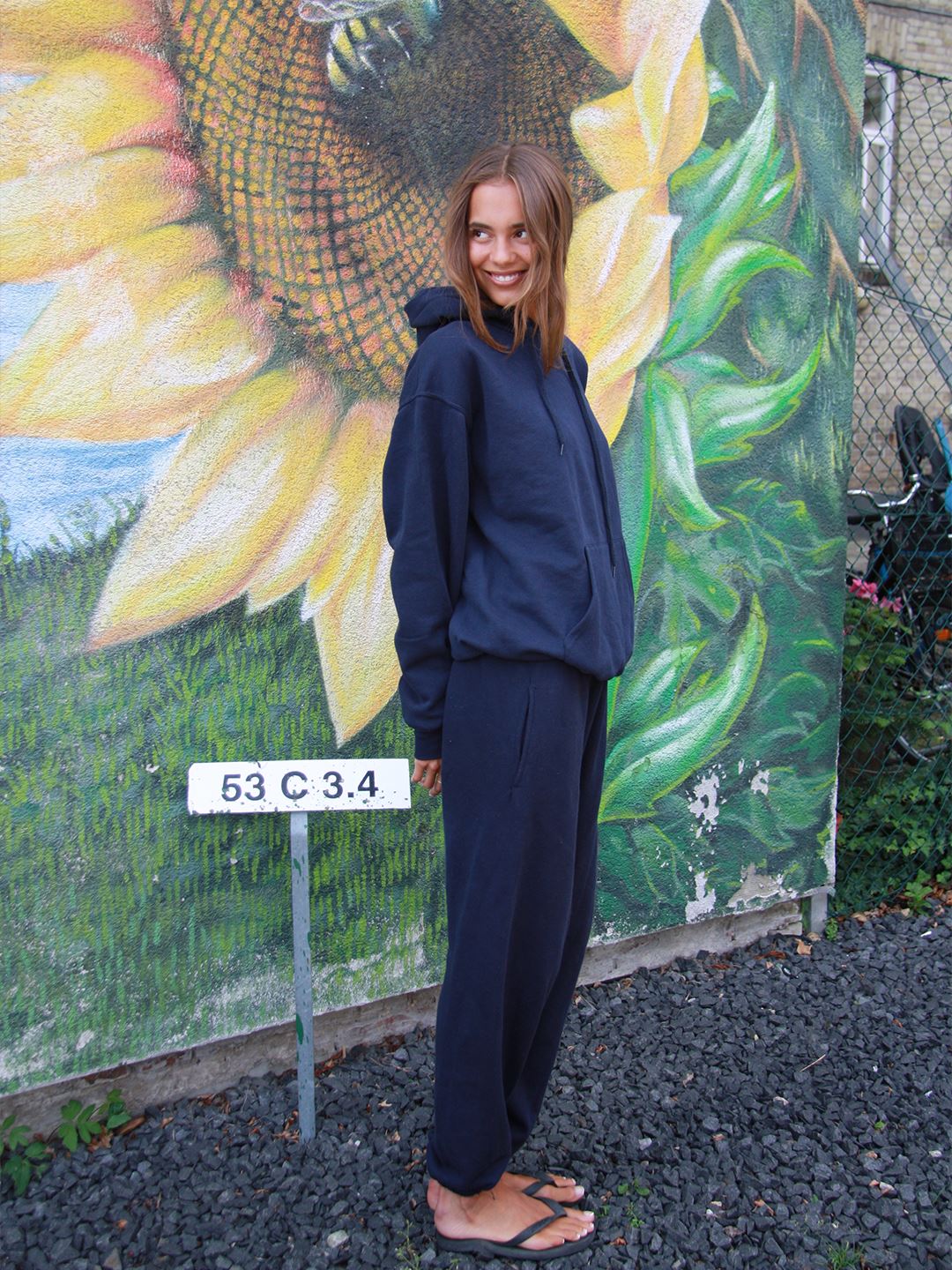 Sarah er 178 cm høj og bruger størrelse M.