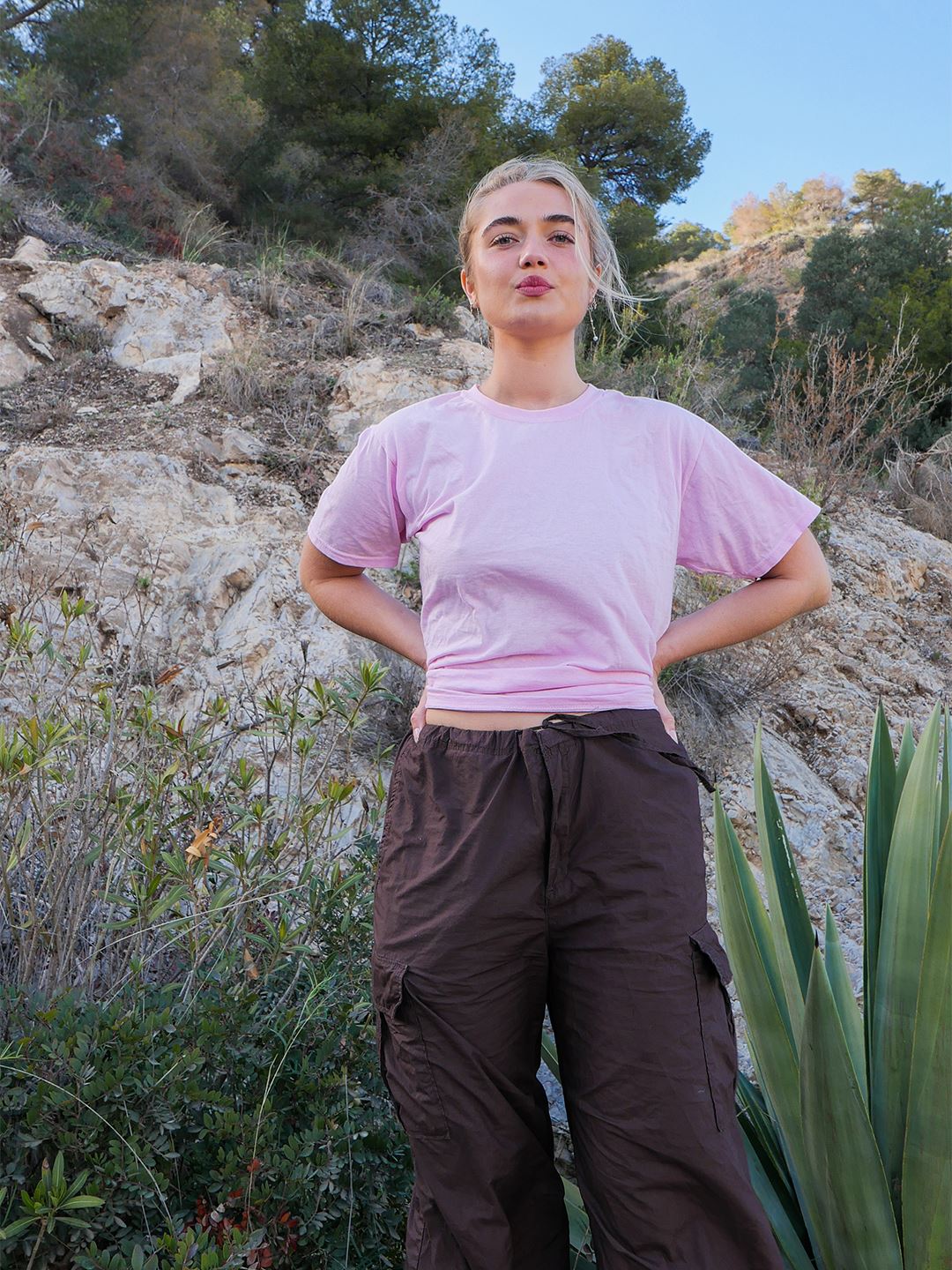 Caroline er 169 cm høj og bruger størrelse M. | lyserød