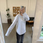 Sofie er 170 cm høj og bruger størrelse L. | grå