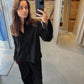 Celine er 168 cm høj og bruger størrelse M. | sort