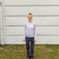 Alma er 174 cm høj og bruger størrelse M | grå