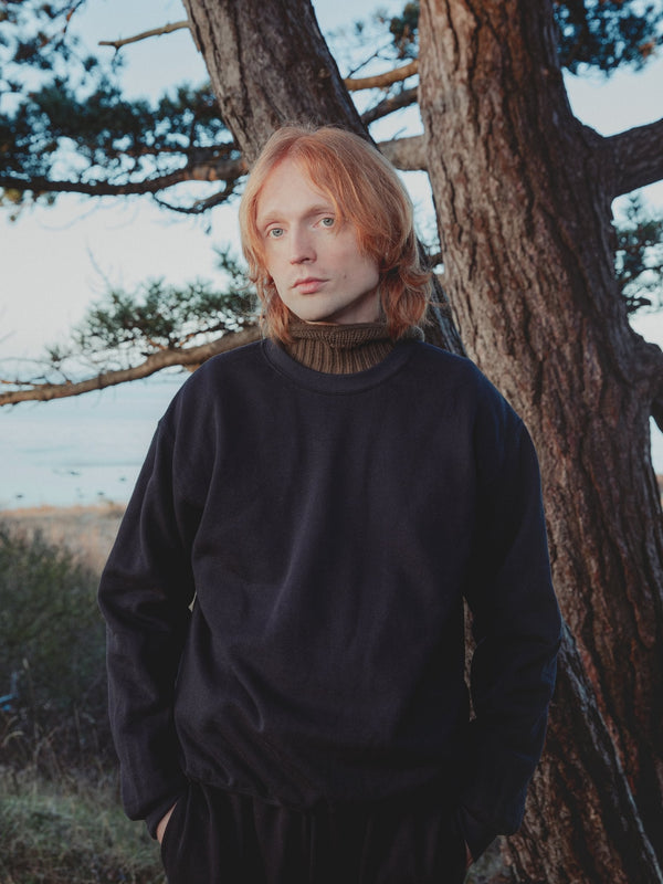 Andreas er 185 cm høj og bruger størrelse L. 