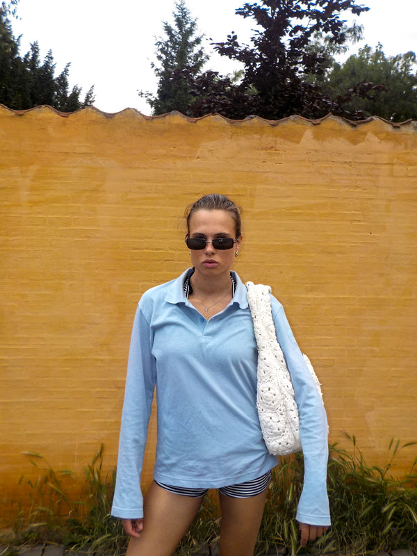 Emma er 173 cm høj og bruger størrelse S. | lyseblå