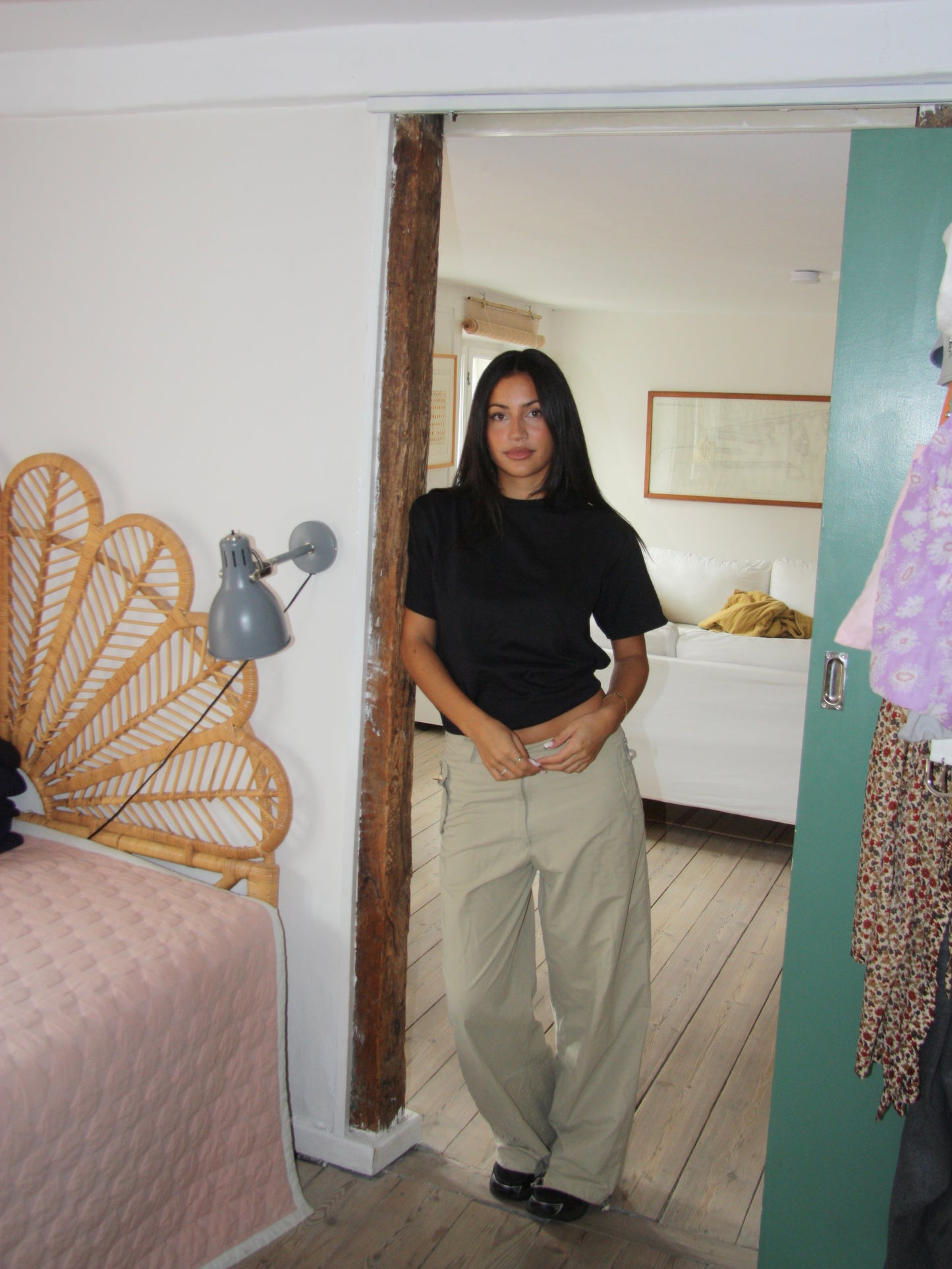 Nanna er 166 cm høj og bruger størrelse S. | sort