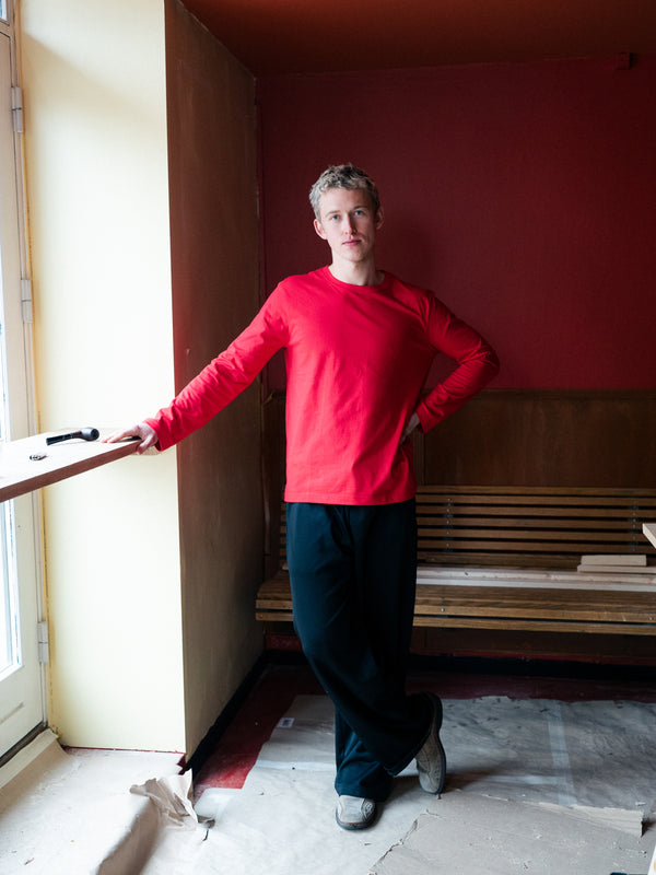 Peter er 188 cm høj og bruger størrelse XL. | rød