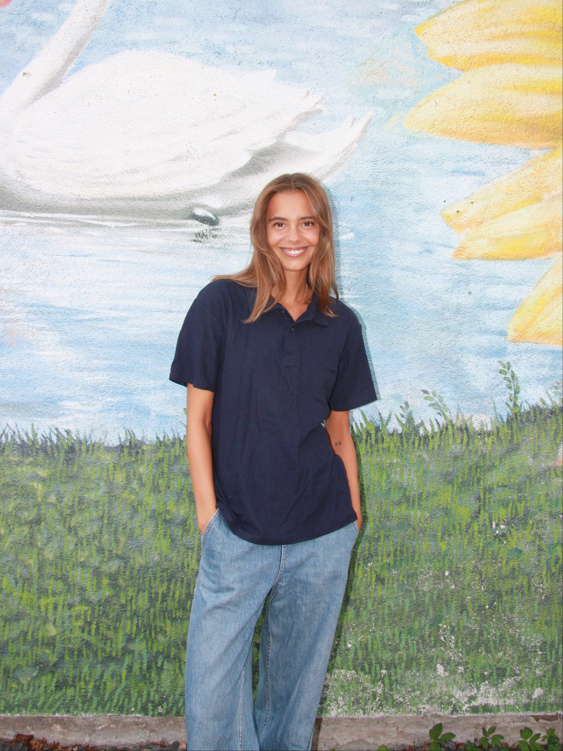 Sarah er 178 cm høj og bruger størrelse M. | mørkeblå